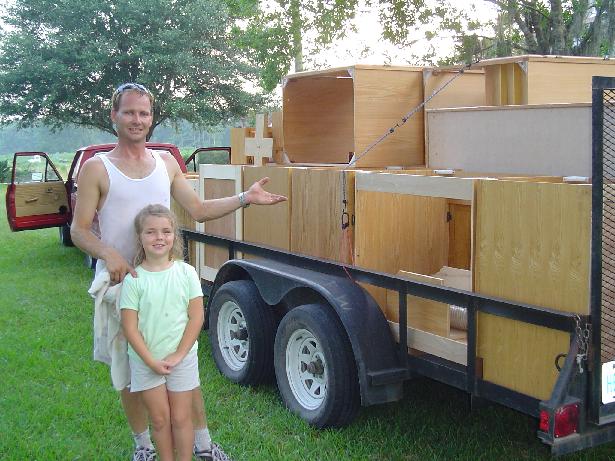 Warren Thomas & Nathalie Loading the Cabinetry