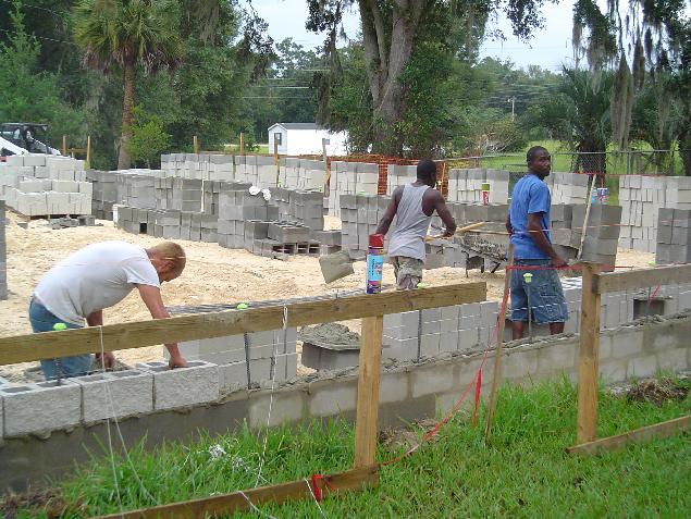 Brick Masons Laying Block