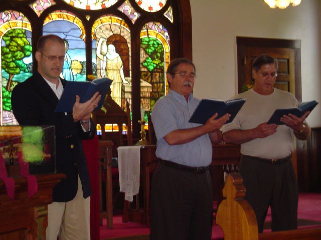 The Men's Section sings "Eternal Father"